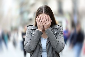 Woman Experiencing A Panic Attack
